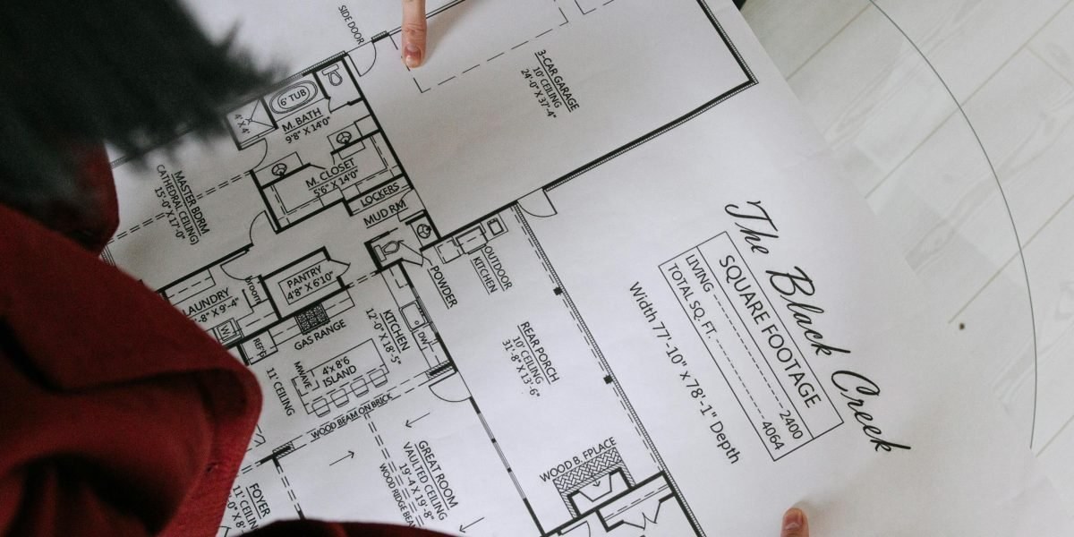 Close-up of property listing notes and floorplan