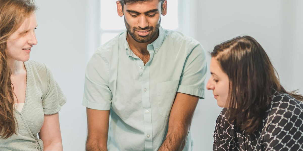 A couple reviews and signs their tenancy agreement, taking a significant step in their rental journey.