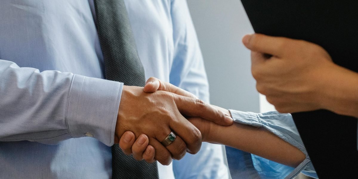 A successful negotiation often concludes with a handshake, symbolizing mutual agreement.